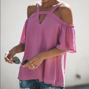 Lilac cut out top. Brand is entro. Gently used.